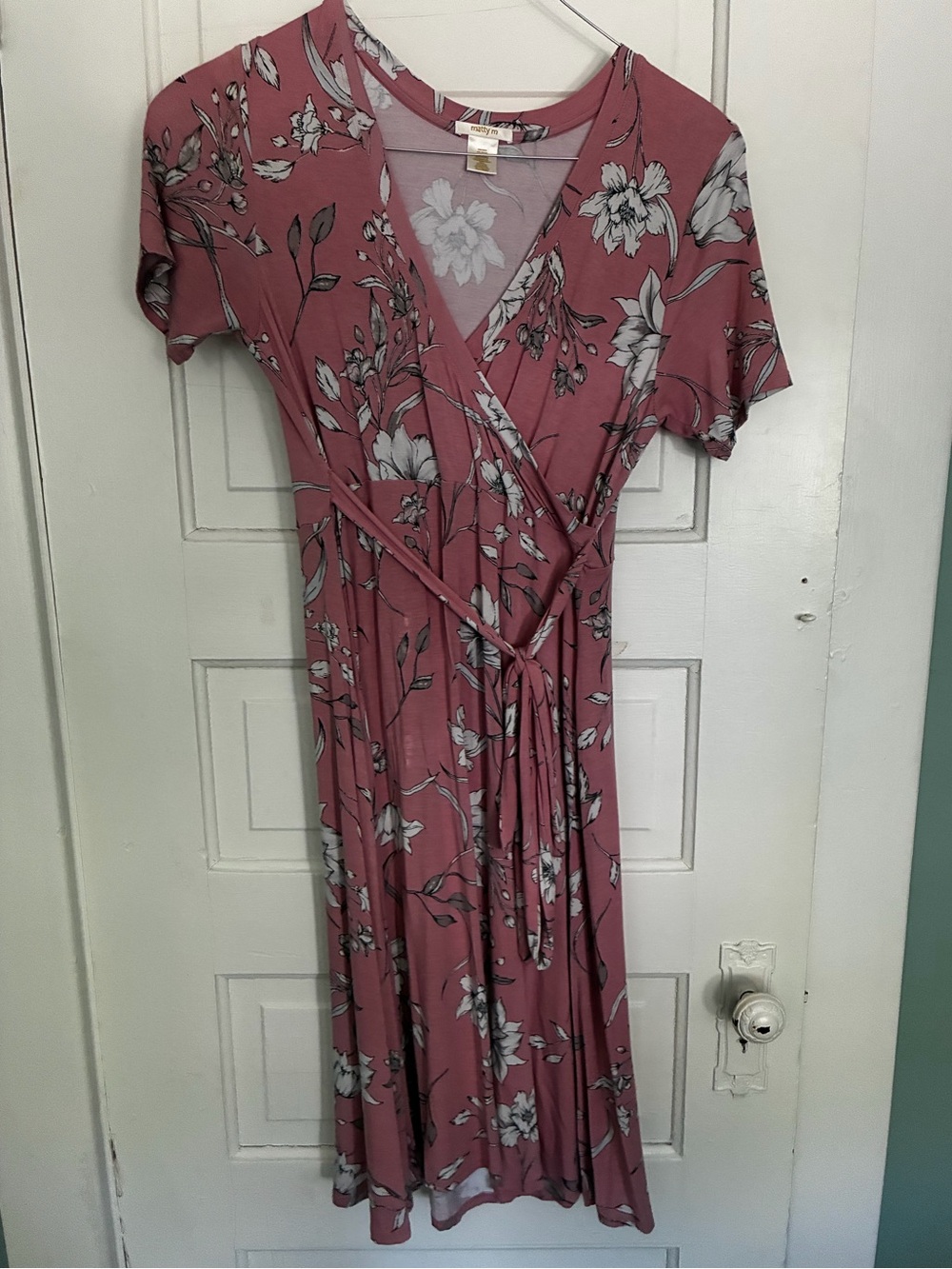 Pink floral wrap-style dress